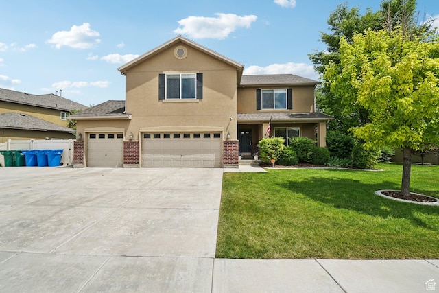469 S Olive Way, Lehi, UT 84043 - traditional home with stucco siding, a front yard, concrete driveway, a garage, and brick siding