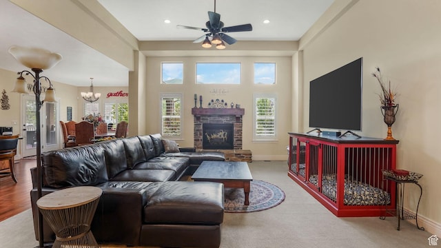 336 S 1400 W, Farmington, UT 84025 - living area featuring baseboards, a fireplace, a chandelier, a ceiling fan, and recessed lighting