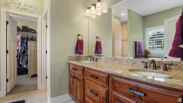 336 S 1400 W, Farmington, UT 84025 - bathroom featuring tile patterned floors, double vanity, and a walk in closet