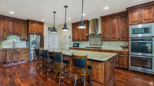 336 S 1400 W, Farmington, UT 84025 - kitchen featuring stainless steel appliances, wall chimney range hood, a sink, decorative backsplash, and recessed lighting