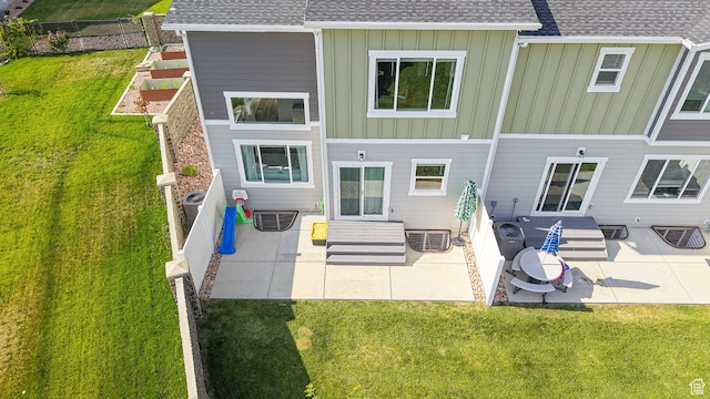 585 W 1420 S, Spanish Fork, UT 84660 - rear view of property with a shingled roof, a patio, and board and batten siding