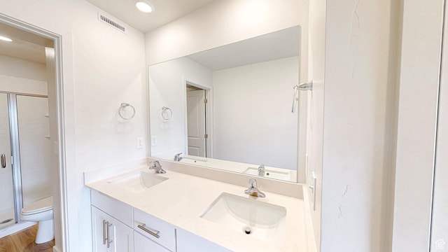 585 W 1420 S, Spanish Fork, UT 84660 - bathroom featuring toilet, a shower stall, double vanity, and recessed lighting