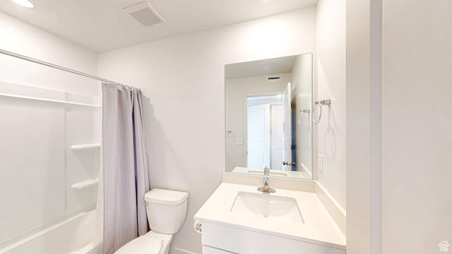 585 W 1420 S, Spanish Fork, UT 84660 - bathroom featuring vanity, toilet, and shower / tub combo with curtain