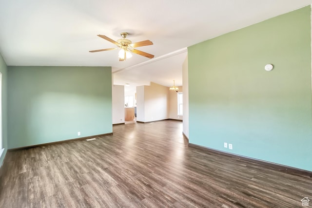 783 S 100 W, Payson, UT 84651 - empty room with wood finished floors, ceiling fan, baseboards, lofted ceiling, and a chandelier