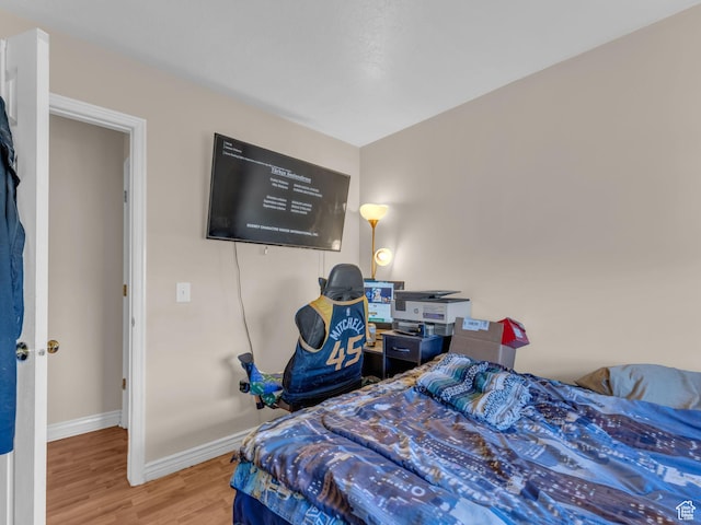 1177 W Dun Robin Ct, Salt Lake City, UT 84123 - bedroom featuring wood finished floors and baseboards