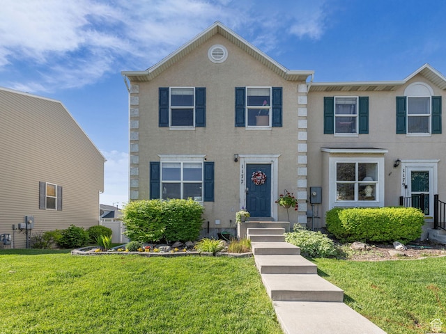 1177 W Dun Robin Ct, Salt Lake City, UT 84123 - view of front facade featuring a front lawn and stucco siding