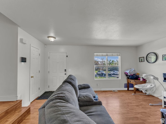 1177 W Dun Robin Ct, Salt Lake City, UT 84123 - living room featuring wood finished floors and baseboards