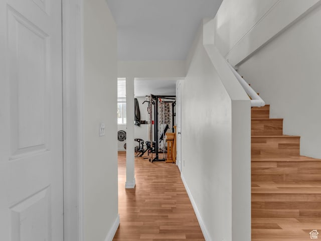 1177 W Dun Robin Ct, Salt Lake City, UT 84123 - corridor featuring light wood-style flooring, baseboards, and stairs