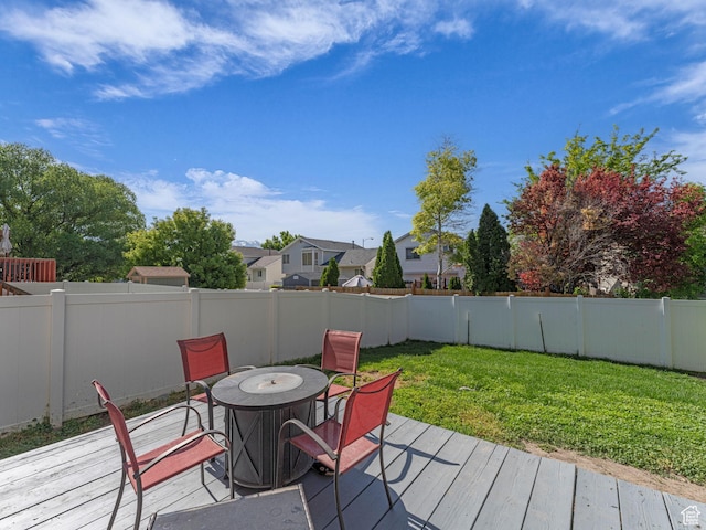 1177 W Dun Robin Ct, Salt Lake City, UT 84123 - wooden deck featuring outdoor dining space and a residential view
