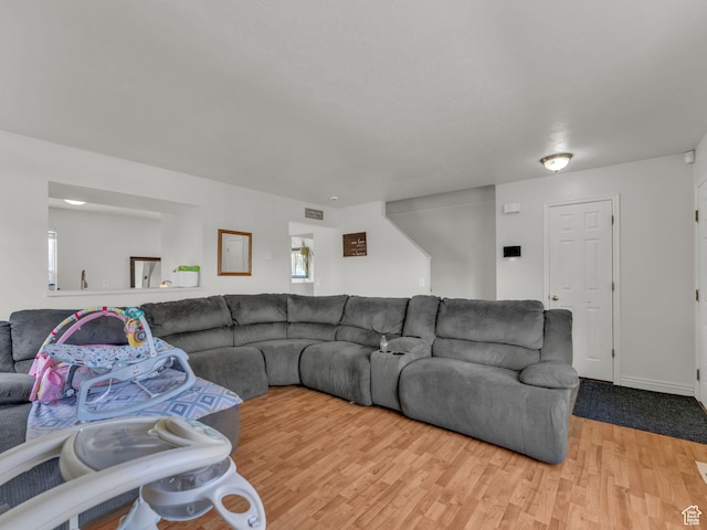 1177 W Dun Robin Ct, Salt Lake City, UT 84123 - living room featuring wood finished floors and plenty of natural light