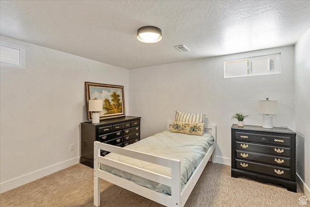669 W 6th Ave, Midvale, UT 84047 - bedroom featuring carpet floors, baseboards, and a textured ceiling