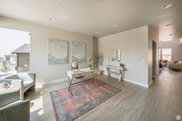 1651 W Canyon Rim Rd Unit 633, Lehi, UT 84043 - living room with wood finished floors, baseboards, recessed lighting, and a textured ceiling