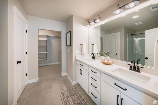 1651 W Canyon Rim Rd Unit 633, Lehi, UT 84043 - full bath featuring double vanity, a shower stall, a spacious closet, and baseboards