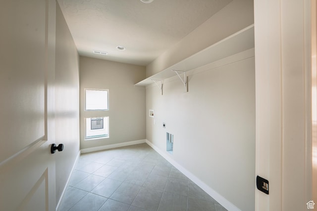 1651 W Canyon Rim Rd Unit 633, Lehi, UT 84043 - washroom featuring tile patterned flooring, electric dryer hookup, washer hookup, and baseboards