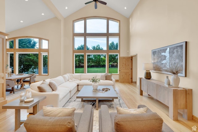 2345 E Lambourne Ave, Millcreek, UT 84109 - living room featuring high vaulted ceiling, light wood-style flooring, ceiling fan, and recessed lighting