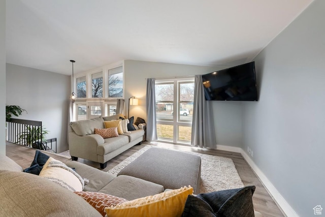 1532 S 200 E, Orem, UT 84058 - living area with vaulted ceiling, baseboards, and wood finished floors
