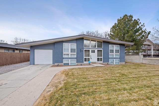 1532 S 200 E, Orem, UT 84058 - mid-century home featuring concrete driveway, brick siding, and an attached garage