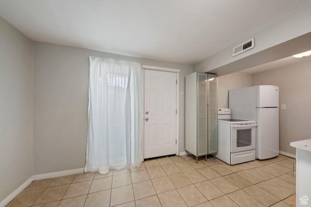1532 S 200 E, Orem, UT 84058 - kitchen featuring white appliances, baseboards, light countertops, and light tile patterned flooring