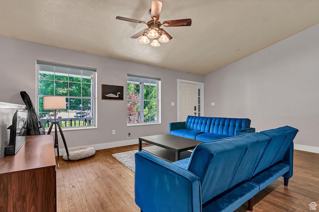 850 E 760 N, Lehi, UT 84043 - living room with ceiling fan, baseboards, wood finished floors, lofted ceiling, and a textured ceiling