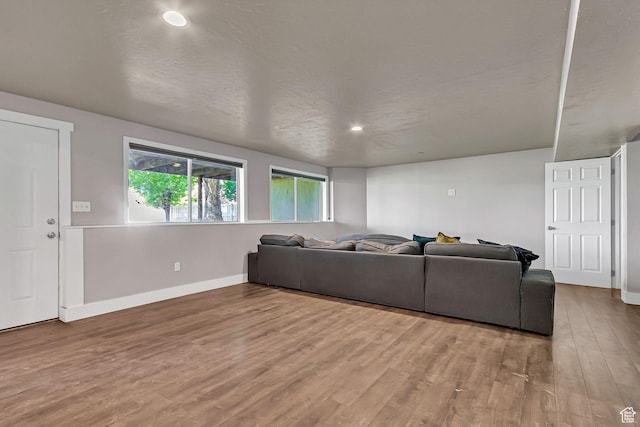 850 E 760 N, Lehi, UT 84043 - living room with wood finished floors, baseboards, and recessed lighting