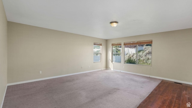 13764 S Rosie Ln, Herriman, UT 84096 - empty room featuring baseboards and wood finished floors