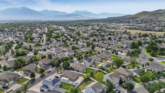 13764 S Rosie Ln, Herriman, UT 84096 - aerial overview of property's location featuring a mountainous background and nearby suburban area