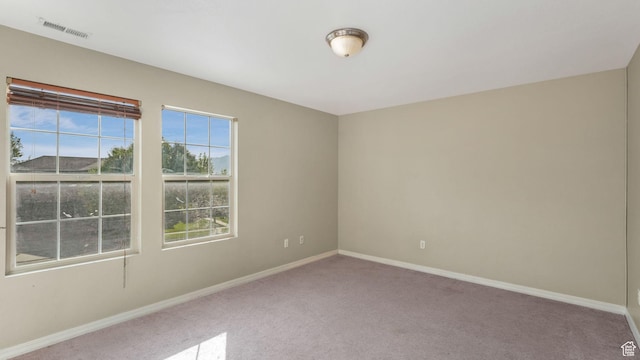 13764 S Rosie Ln, Herriman, UT 84096 - empty room featuring carpet flooring and baseboards
