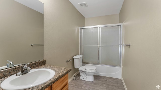 13764 S Rosie Ln, Herriman, UT 84096 - full bath with baseboards, toilet, vanity, and enclosed tub / shower combo