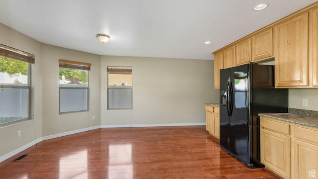 13764 S Rosie Ln, Herriman, UT 84096 - kitchen with black fridge with ice dispenser, dark wood-type flooring, recessed lighting, baseboards, and light brown cabinetry