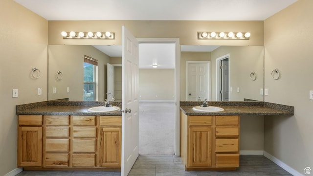 13764 S Rosie Ln, Herriman, UT 84096 - full bath featuring baseboards and two vanities