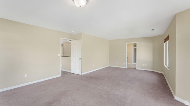 13764 S Rosie Ln, Herriman, UT 84096 - spare room featuring baseboards and carpet