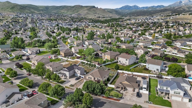13764 S Rosie Ln, Herriman, UT 84096 - aerial view of property and surrounding area featuring mountains and nearby suburban area