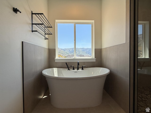 1141 E 4100 N, North Ogden, UT 84414 - full bathroom with a freestanding bath, wainscoting, and tile patterned floors