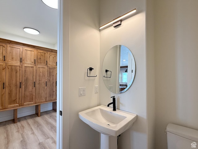 1141 E 4100 N, North Ogden, UT 84414 - bathroom with wood finished floors, toilet, and a sink