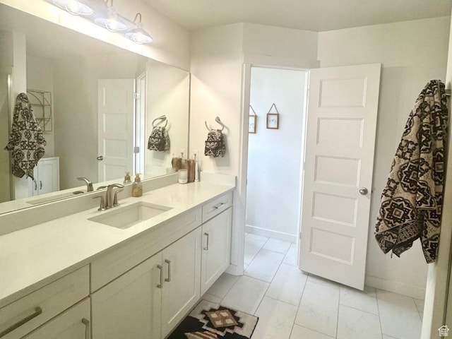 953 N 850 E Unit 229, Layton, UT 84041 - bathroom featuring vanity, baseboards, and marble look tile flooring
