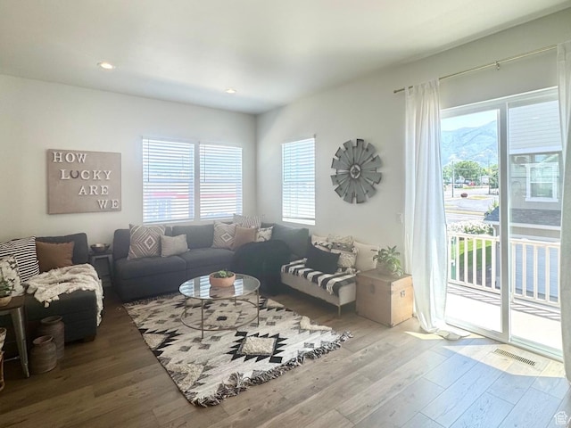 953 N 850 E Unit 229, Layton, UT 84041 - living area with plenty of natural light, wood finished floors, and recessed lighting