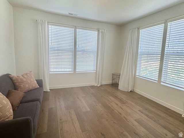 953 N 850 E Unit 229, Layton, UT 84041 - sitting room featuring wood finished floors and baseboards