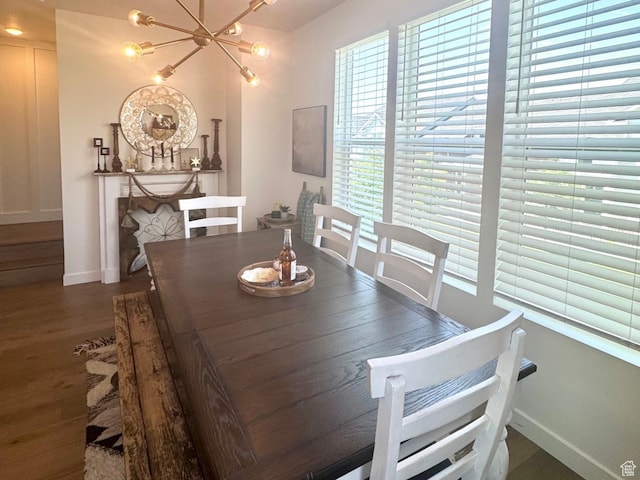 953 N 850 E Unit 229, Layton, UT 84041 - dining room with baseboards, wood finished floors, and a chandelier
