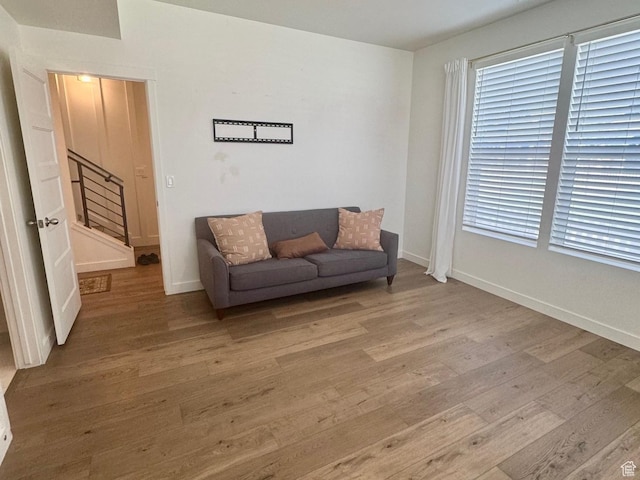 953 N 850 E Unit 229, Layton, UT 84041 - sitting room with light wood finished floors, baseboards, and healthy amount of natural light