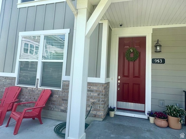 953 N 850 E Unit 229, Layton, UT 84041 - property entrance featuring board and batten siding, stone siding, and a security system