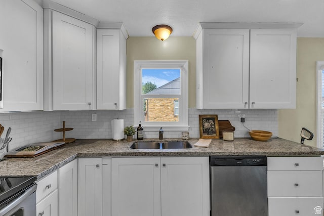 954 E 300 S, Provo, UT 84606 - kitchen featuring stainless steel dishwasher, a sink, and white cabinetry