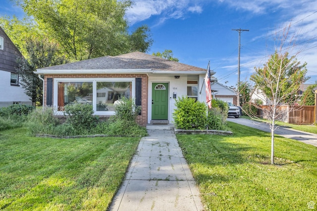 954 E 300 S, Provo, UT 84606 - bungalow with roof with shingles and brick siding