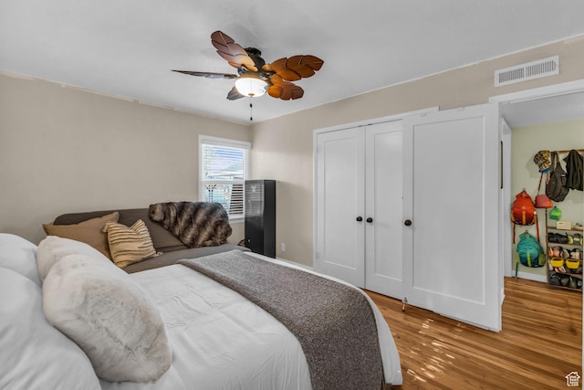 954 E 300 S, Provo, UT 84606 - bedroom with wood finished floors, a closet, a ceiling fan, and baseboards