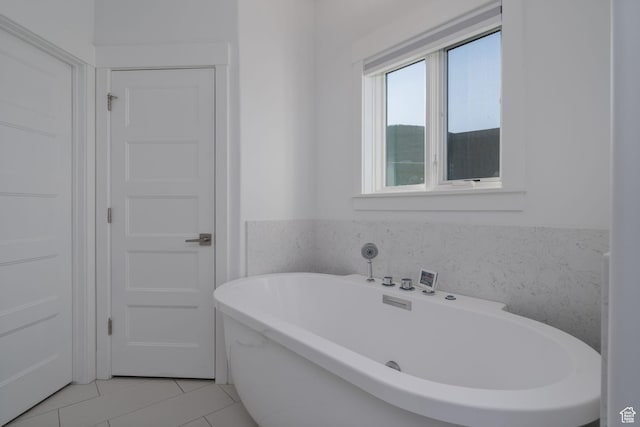 11103 N Shoreline Dr Unit # 3, Hideout, UT 84036 - bathroom with a freestanding tub and tile patterned flooring