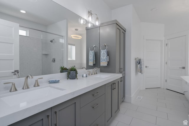 11103 N Shoreline Dr Unit # 3, Hideout, UT 84036 - bathroom featuring double vanity, walk in shower, and tile patterned flooring
