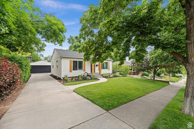 2524 E Redondo Ave, Salt Lake City, UT 84108 - view of front facade with an outbuilding, a front yard, and a garage