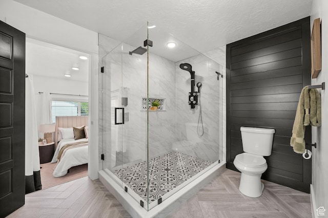 2524 E Redondo Ave, Salt Lake City, UT 84108 - ensuite bathroom with toilet, a shower stall, recessed lighting, and a textured ceiling