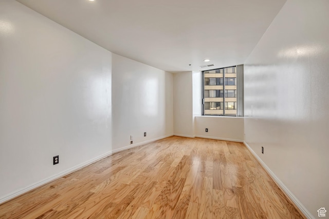 48 W 300 S Unit 1803N, Salt Lake City, UT 84101 - spare room featuring wood finished floors, recessed lighting, and baseboards