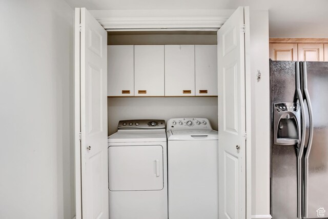 48 W 300 S Unit 1803N, Salt Lake City, UT 84101 - laundry area featuring washing machine and dryer and cabinet space