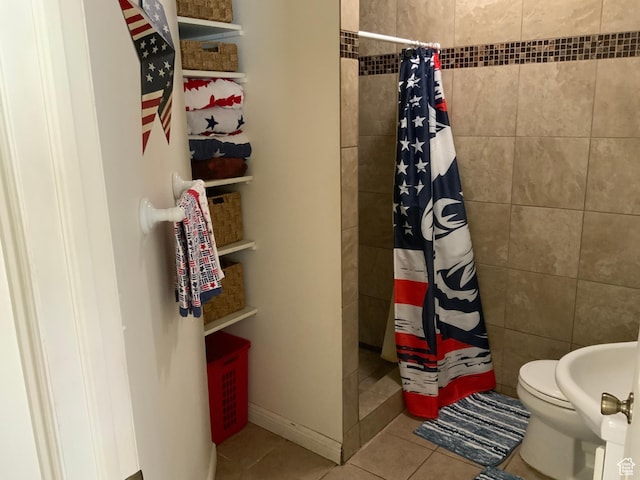 955 N Catherine St, Salt Lake City, UT 84116 - full bathroom featuring a tile shower, tile patterned floors, and toilet